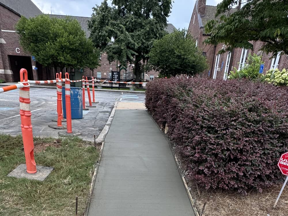 Completed concrete sidewalk section